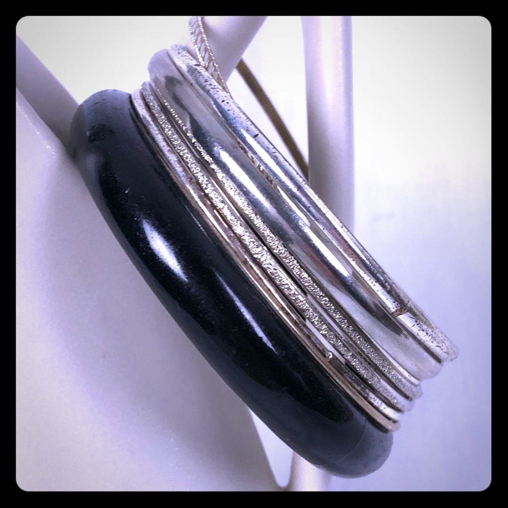 Set of Vintage light silver bangles